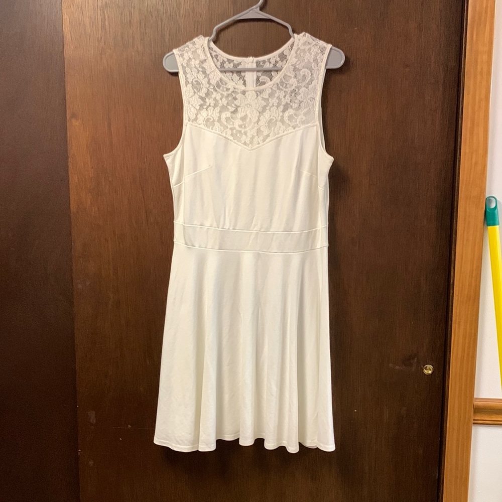 White knee length dress. Perfect for bridal events!